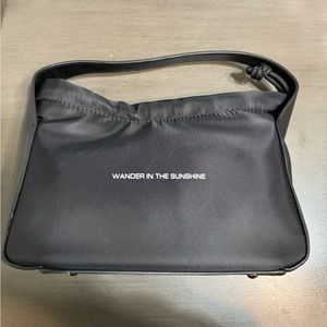 Wander in the sun drawstring bag